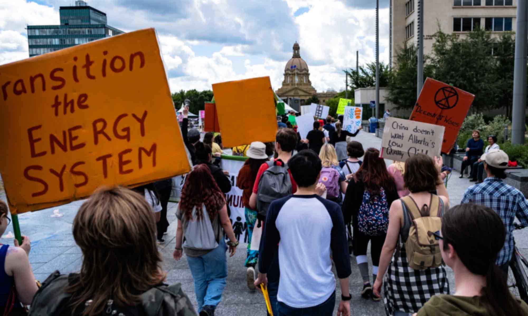 Young climate strikers marching towards the Alberta Legislature